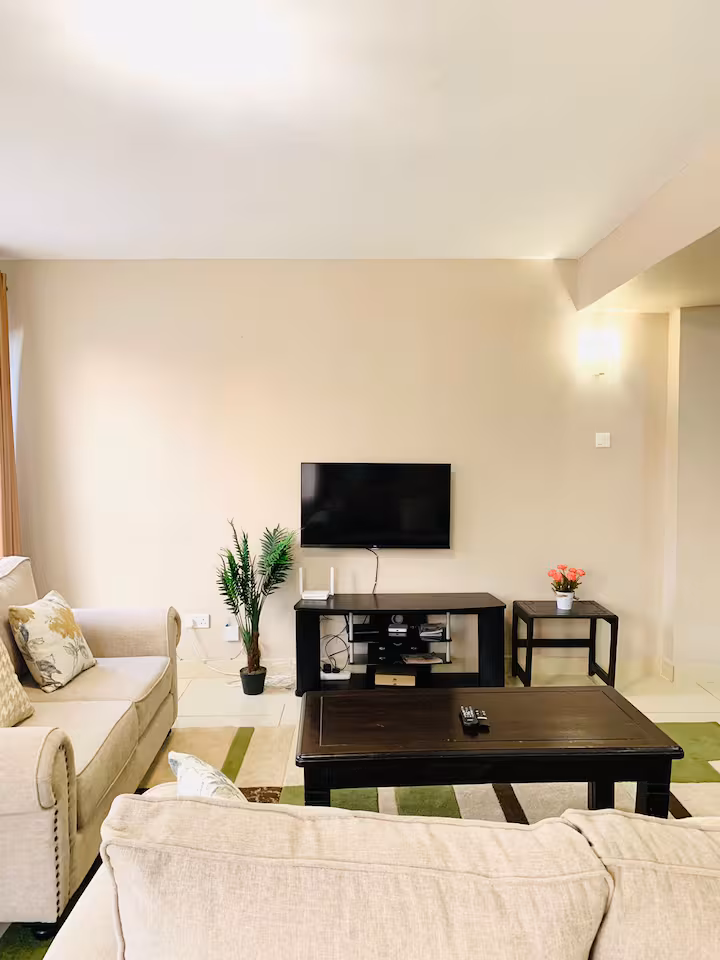 One Bedroom Apartment furnished interior at Emilia Apartments, view 4