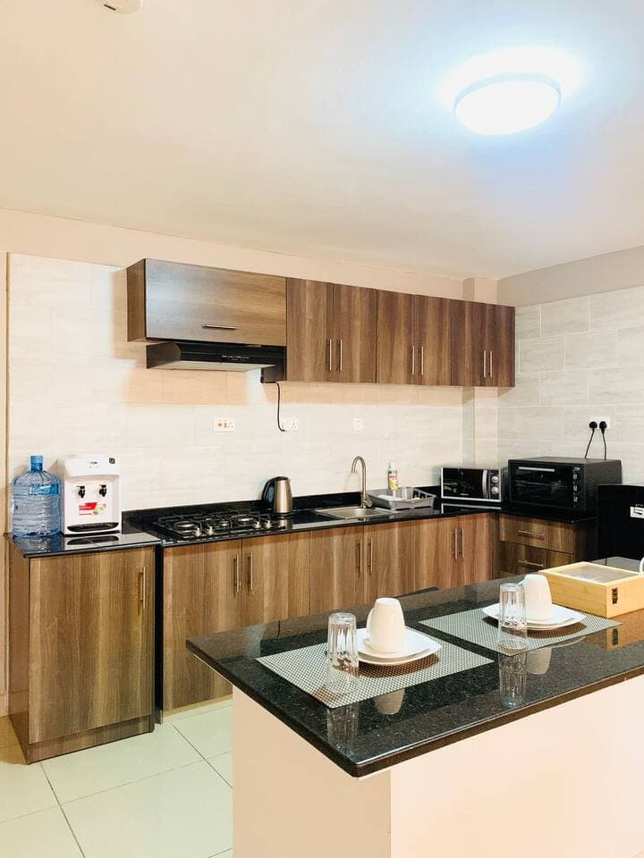 One Bedroom Apartment furnished interior at Emilia Apartments, view 5