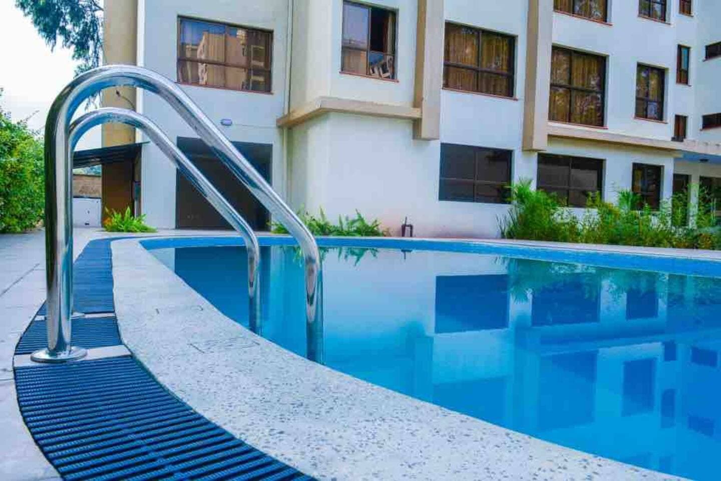 Outdoor Swimming Pool at Emilia Apartments